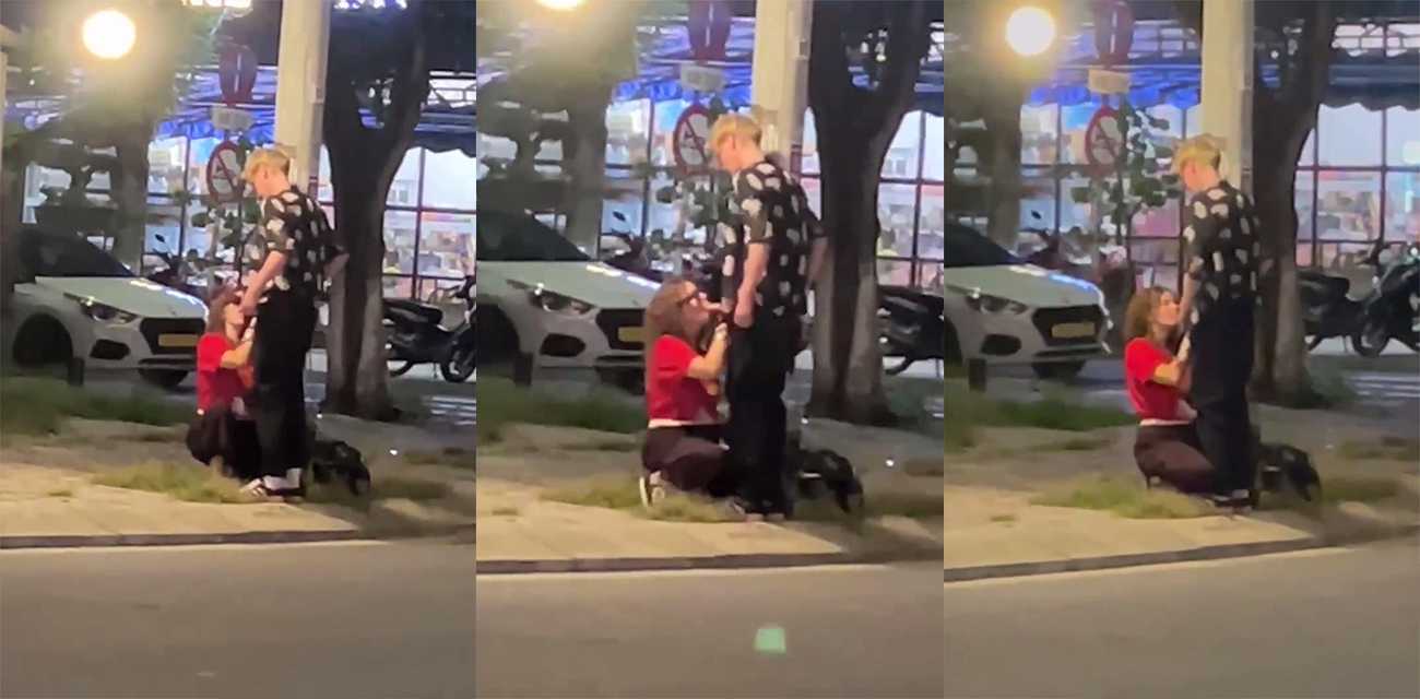 越南峴港街頭 驚現野戰男女 紅衣女當街跪舔黃毛男大屌 連擼帶吸玩深喉！
